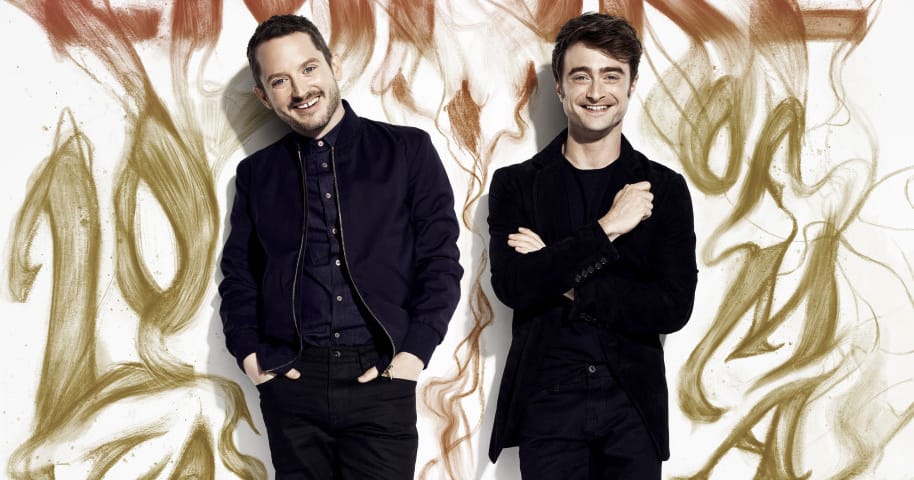 Daniel Radcliffe ao lado de Elijah Wood